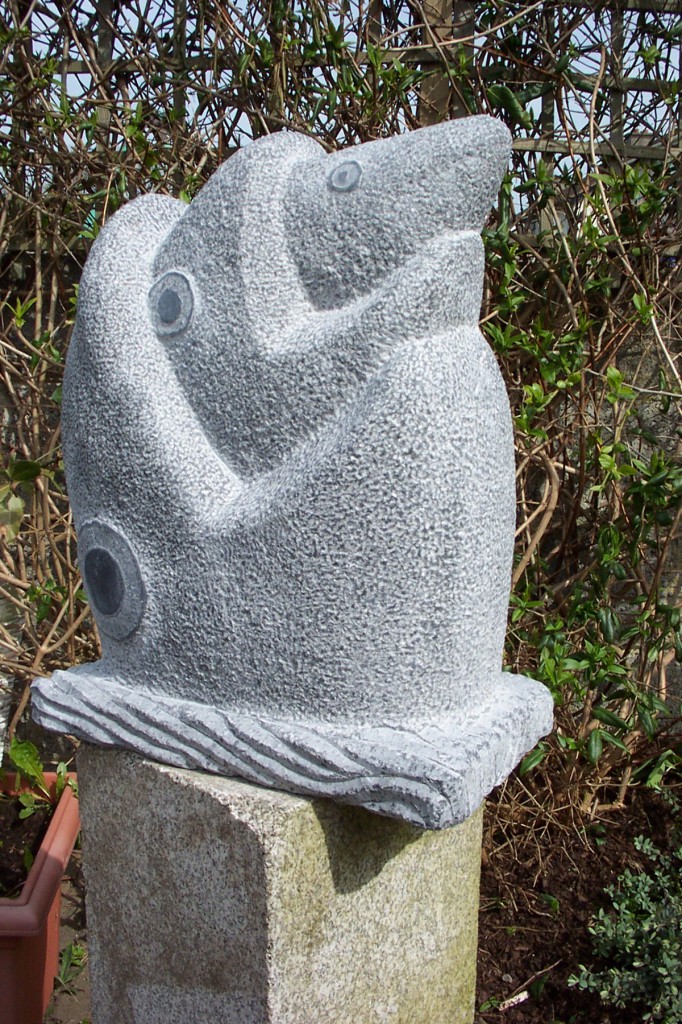 Fish eating fish - Carved in Irish limestone, in Dublin. Punched technique with polished eyes.
