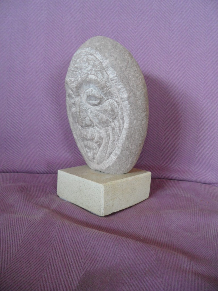 Small Medieval head. Sandstone.